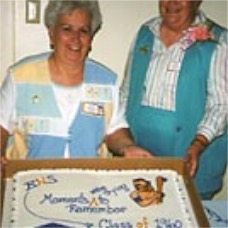 Verma & Rose with cake.jpg