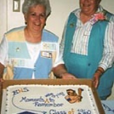 Verma & Rose with cake.jpg